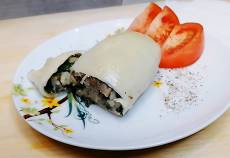 Кальмары фаршированные рисом и грибами